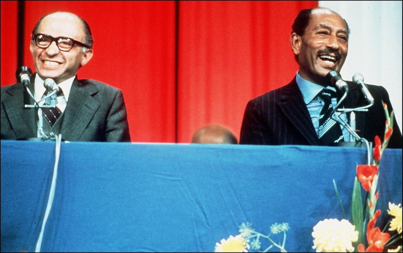 Photo taken on 20 November 1977 of Egyptian President Anwar Sadat (R) during a joint press conference he gave with Israeli Prime Minister Menachem Begin during his historic visit to Israel. - His widow Jihane said in an interview broadcast on Israeli television on 19 November that her husband "knew he was going to die, but that did not change his mind in his peace endeavor". Anwar al-Sadat's visit to Israel led fifteen months later to the signing of the first peace treaty between Israel and an Arab country. In October 1981, Sadat was assassinated in Cairo by Islamists. (Photo by - / AFP)