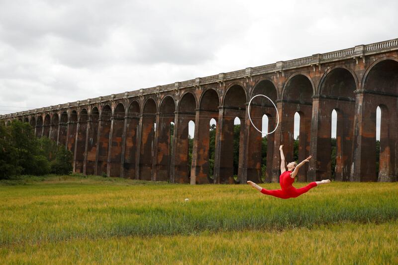 Former Team GB Rhythmic Gymnastic star and dancer Hannah Martin during a training session at Ouse Valley Viaduct, following the outbreak of the coronavirus disease in Sussex, Britain. Reuters