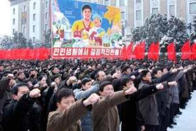 epa01978463 Citizens of Pyongyang take part in a mass rally held at Kim Il Sung Square, as they vow to carry through the tasks established for the new year, Pyongyang, North Korea's capital city, 02 January 2010.  EPA/KCNA *** Local Caption ***  01978463.jpg