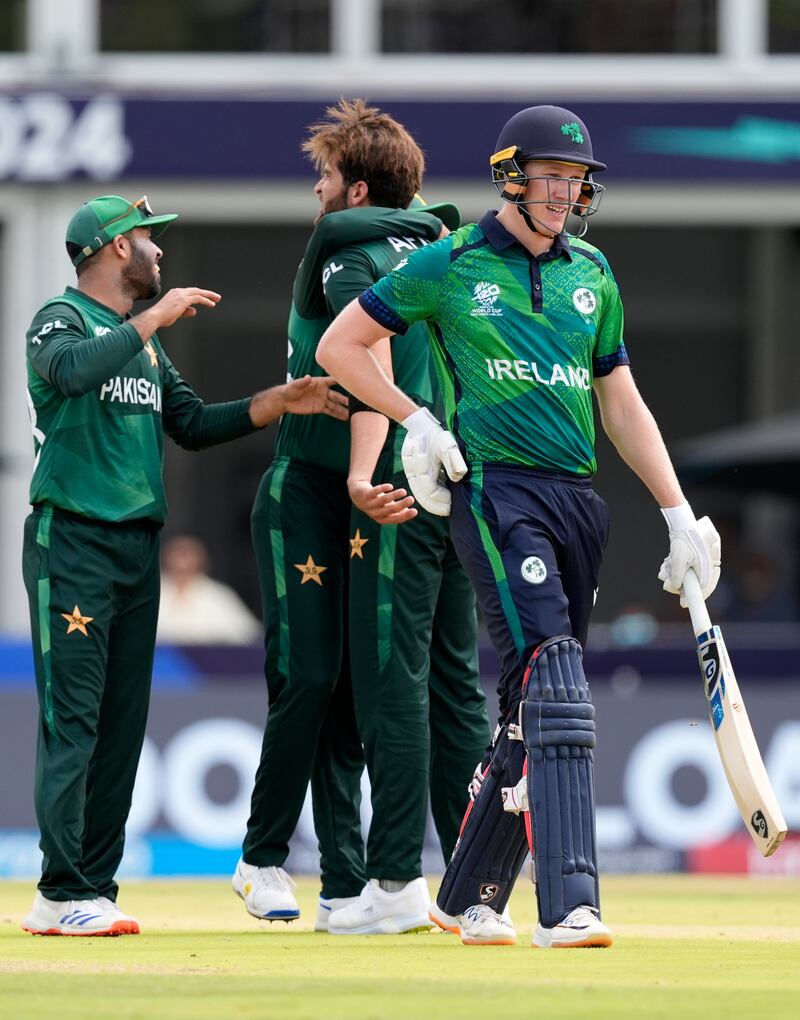 Ireland's Harry Tector, right, after being out lbw to Pakistan's Shaheen Afridi. AP