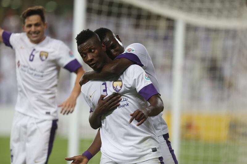 Al Ain striker Asamoah Gyan is congratulated by teammate Ibrahim Diaky after his goal against Al Jazira in the Asian Champions League on Tuesday. Delores Johnson / The National / May 13, 2014