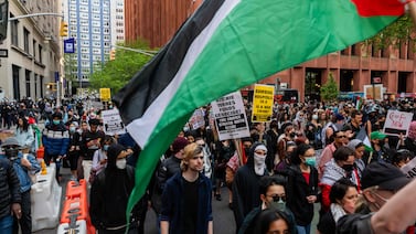 Pro-Palestinian protesters gather outside of New York University (NYU) buildings in lower Manhattan on May 3, 2024. AFP
