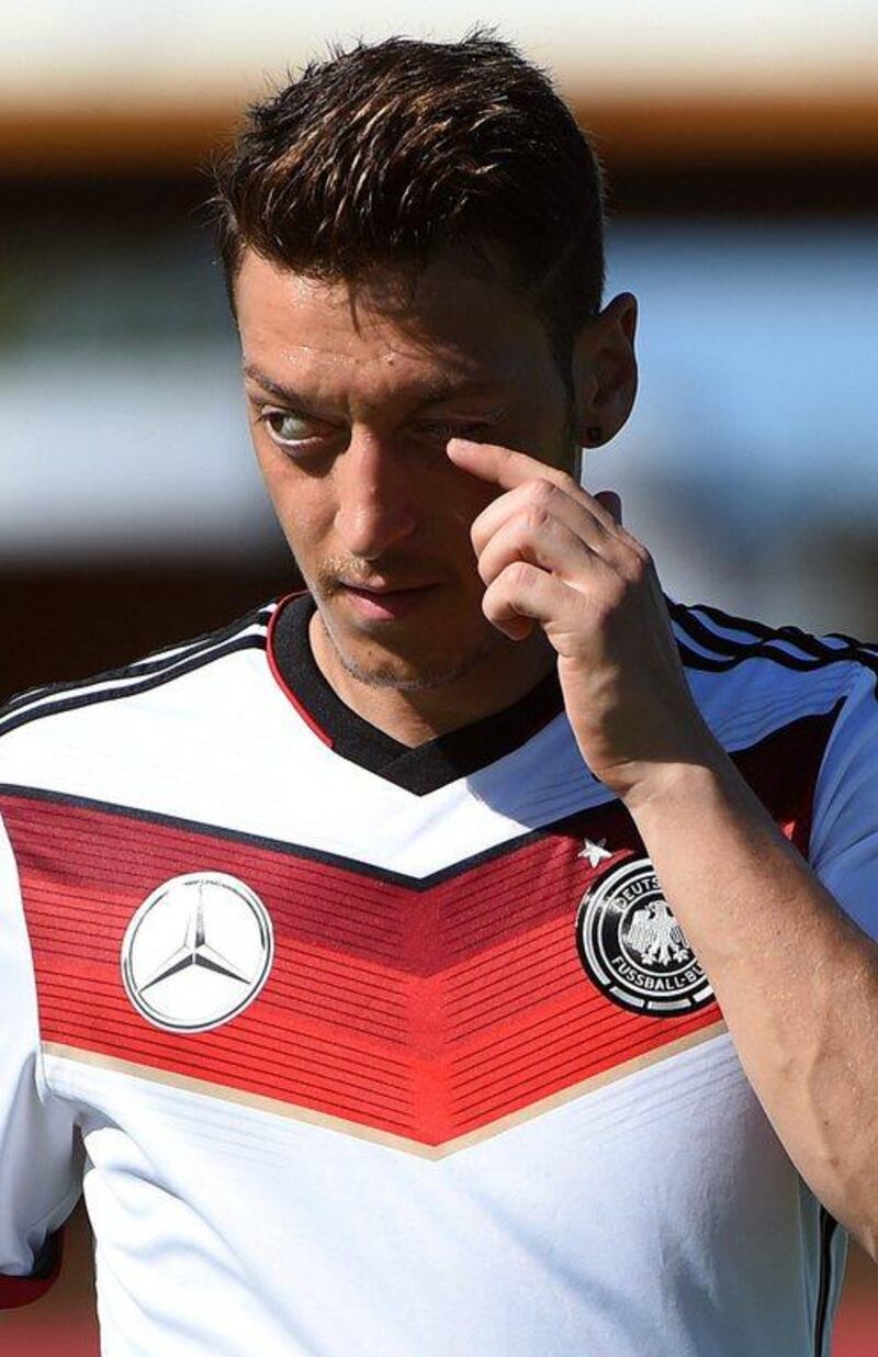 Mesut Ozil's national team form has been criticised ahead of Germany's World Cup 2014 Group G opener against Portugal on Monday. Patrik Stollarz / AFP / June 11, 2014