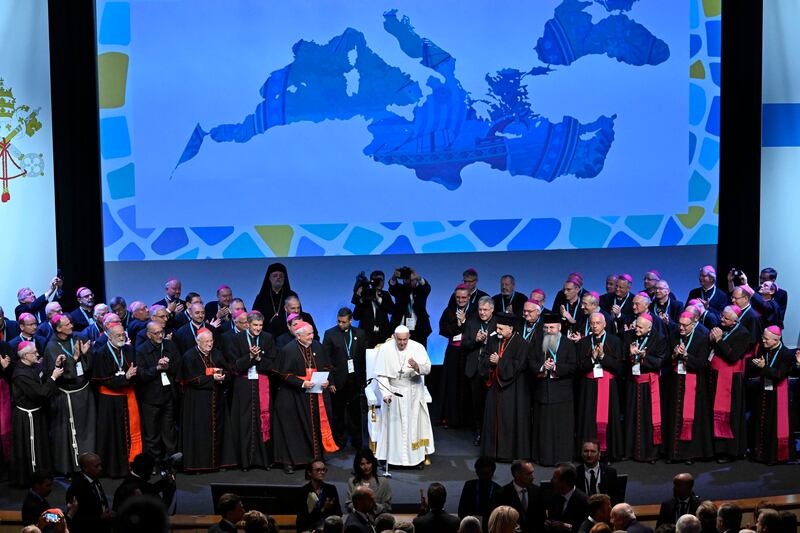Pope Francis is applauded at the final session of the 'Mediterranean Meetings' at the Palais du Pharo, in Marseille, EPA