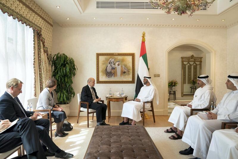 ABU DHABI, UNITED ARAB EMIRATES - October 28, 2019: HH Sheikh Mohamed bin Zayed Al Nahyan, Crown Prince of Abu Dhabi and Deputy Supreme Commander of the UAE Armed Forces (center R), meets with HE Jean-Yves Le Drian, Minister of Europe and Foreign Affairs of France (center L). Seen with HE Khaldoon Khalifa Al Mubarak, CEO and Managing Director Mubadala, Chairman of the Abu Dhabi Executive Affairs Authority and Abu Dhabi Executive Council Member (R) and HH Sheikh Abdullah bin Zayed Al Nahyan, UAE Minister of Foreign Affairs and International Cooperation (2nd R).

( Mohamed Al Hammadi / Ministry of Presidential Affairs )
---