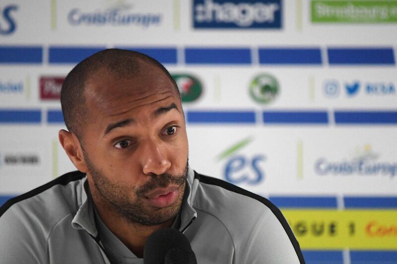 Monaco's French Coach Thierry Henry speaks during a press conference following the French L1 football match between Strasbourg (RCSA) and Monaco on October 20, 2018 at the Meinau stadium in Strasbourg, eastern France. Thierry Henry suffered defeat in his first match as a head coach when his 10-man Monaco side slumped to a 2-1 loss at Strasbourg to drop into the Ligue 1 relegation zone, while Paris Saint-Germain eased to a 10th straight victory to start their title defence. / AFP / FREDERICK FLORIN
