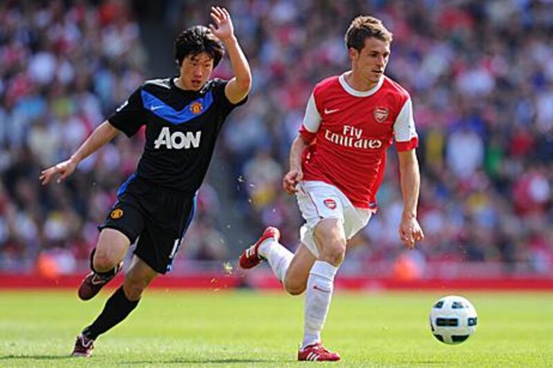 Aaron Ramsey, right, the Arsenal match-winner, evades Manchester United's Park Ji-sung, during their 1-0 win at the Emirates Stadium.