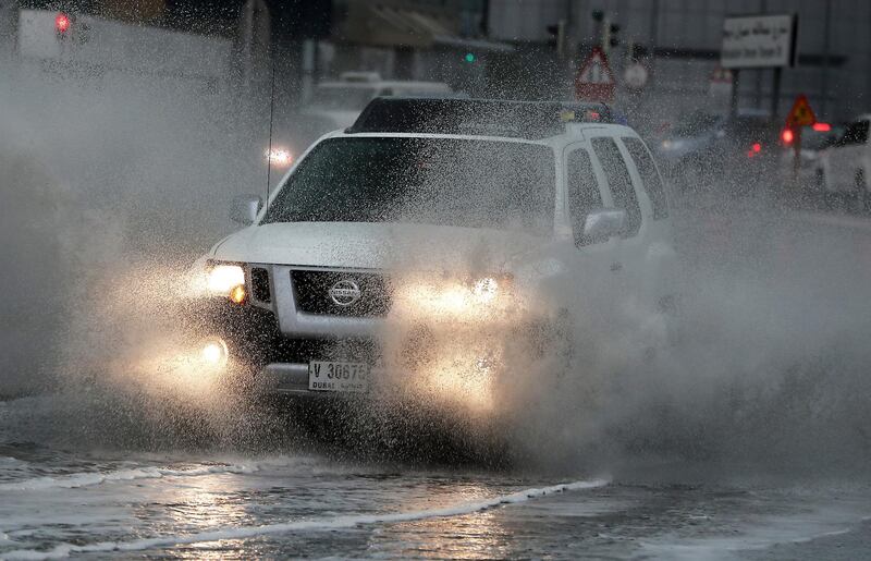 DUBAI, UNITED ARAB EMIRATES , Nov 10  – 2019 :- Traffic going through water logged street after heavy rain in Dubai Internet City in Dubai. ( Pawan Singh / The National )  For News