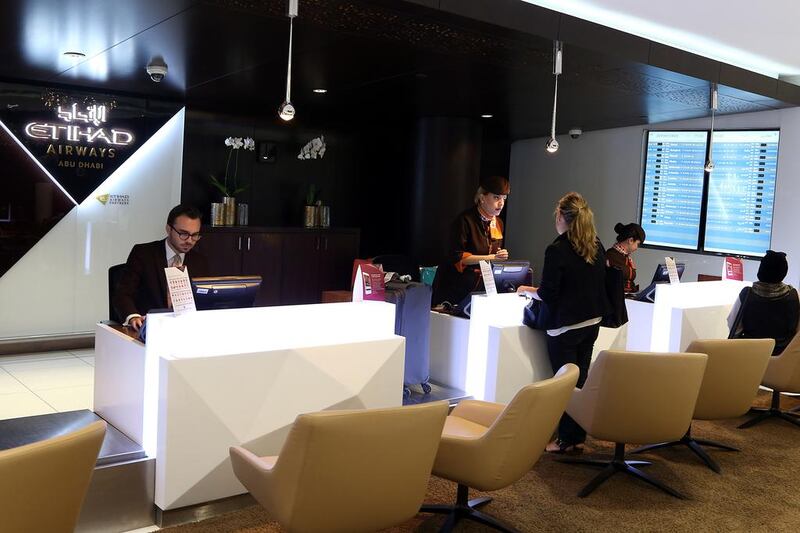 The concierge desk for the Etihad Airways First Class check-in at Abu Dhabi International Airport. Delores Johnson / The National