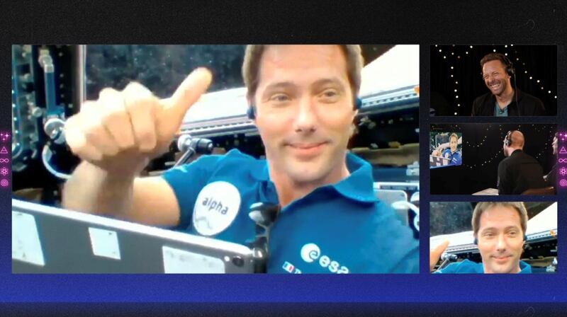 French ESA astronaut Thomas Pesquet gestures during an interview with members of Coldplay, in this still image from an undated handout video obtained by REUTERS on May 6, 2021. Coldplay/Handout via REUTERS  ATTENTION EDITORS - THIS IMAGE HAS BEEN SUPPLIED BY A THIRD PARTY. NO RESALES. NO ARCHIVES. MANDATORY CREDIT