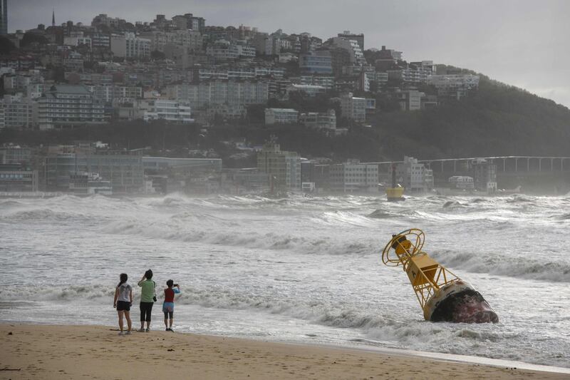 A buoy un-tethered during heavy swell brought by Typhoon Maysak on Haeundae beach in Busan.  AFP