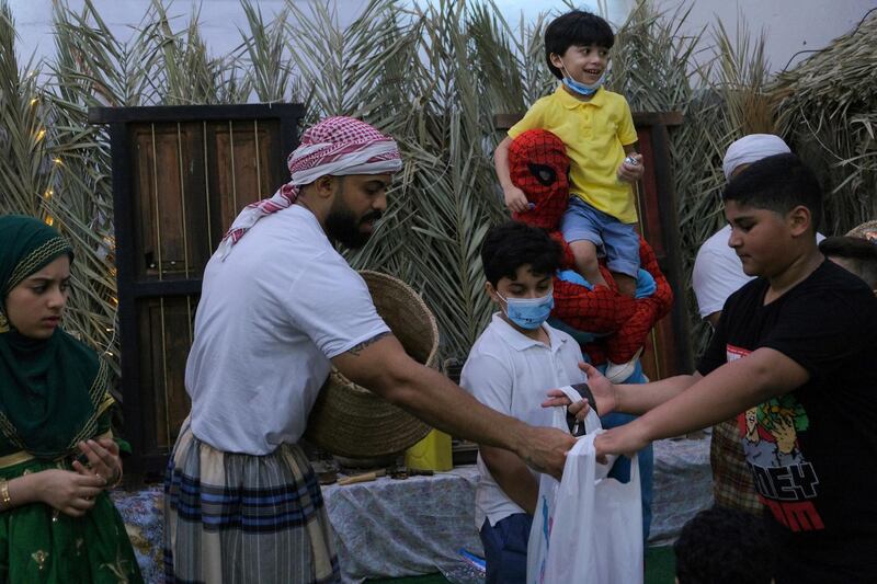 During Gargee'an, children go door-to-door to receive sweets from neighbours. Reuters