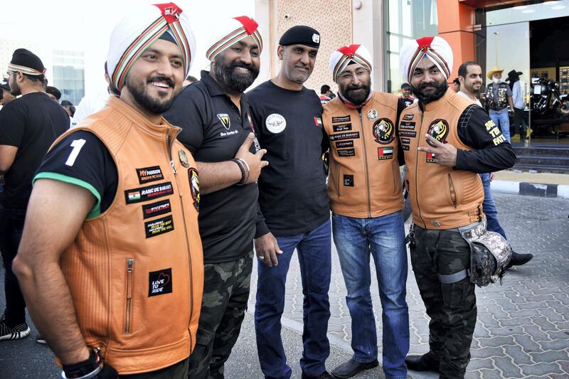 Members of Sikh Bikers group pose for a photograph outside the Harley Davidson showroom during the 48th National Rally "Love Zayed" in Sharjah, UAE, Friday, Nov. 29, 2019. Shruti Jain The National