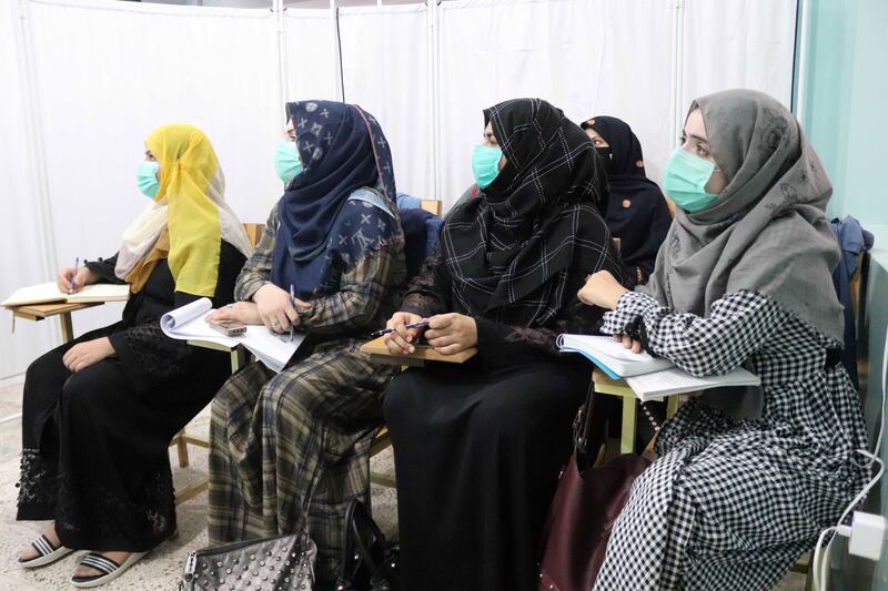 Afghan students at Mirwais Neeka University in Kandahar, Afghanistan are now segregated by gender, following new laws imposed by the Taliban.  EPA