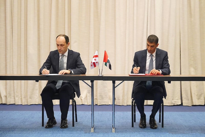 Dr Thani Al Zeyoudi, UAE Minister of State for Foreign Trade, right, and Levan Davitashvili, Georgia’s Vice Prime Minister and Minister of Economy and Sustainable Development, sign the agreement. Photo: UAE Government
