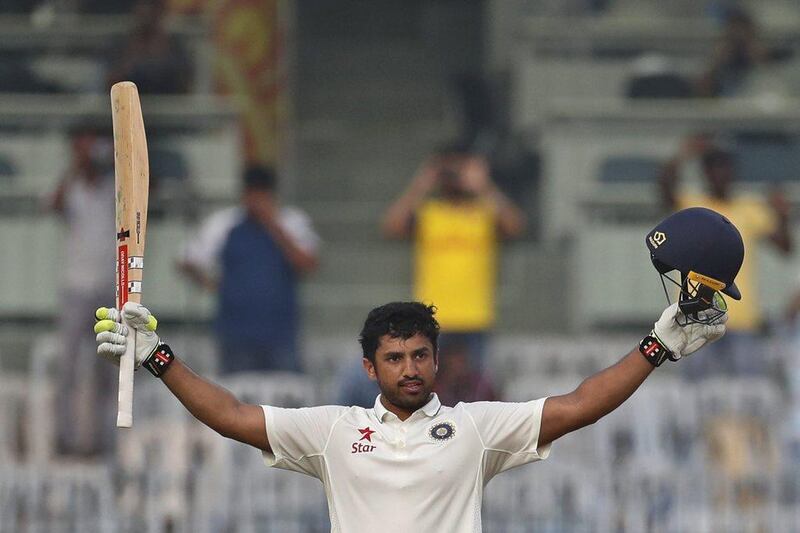 India's Karun Nair raises his bat after scoring three hundred runs against England during their fourth day of the fifth Test on Monday in Chennai. Tsering Topgyal / AP Photo / December 19, 2016