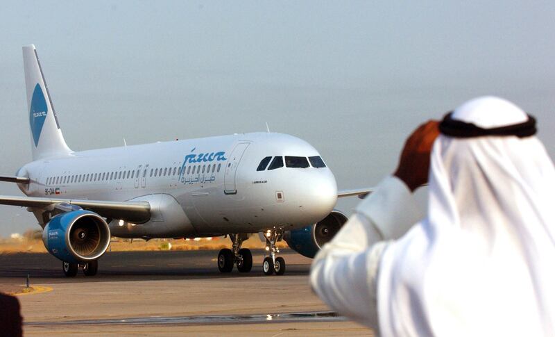 A Jazeera Airlines Airbus A-320 plane taxies towards the departure gates at Kuwait International Airport. AP Photo