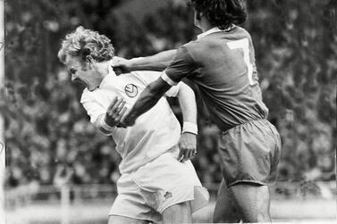 Liverpool's Kevin Keegan and Leeds United's Billy Bremner punch it out at Wembley in one of the most famous on-field football brawls