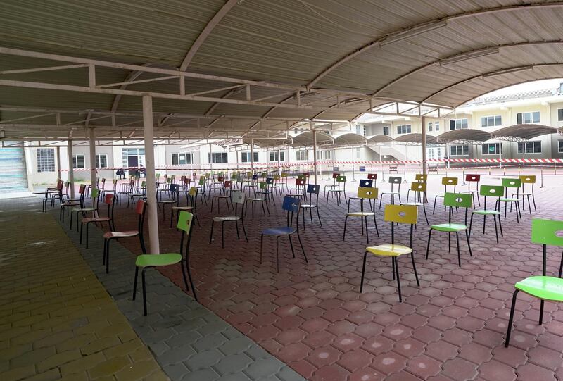 Chairs are spaced for social distancing, in a secondary school used as a makeshift polling station, ahead of parliamentary elections in Kuwait city, Kuwait December 3, 2020. REUTERS/Stephanie McGehee