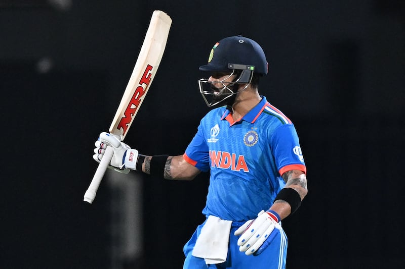 India's Virat Kohli celebrates after reaching his fifty against Australia in Chennai. AFP