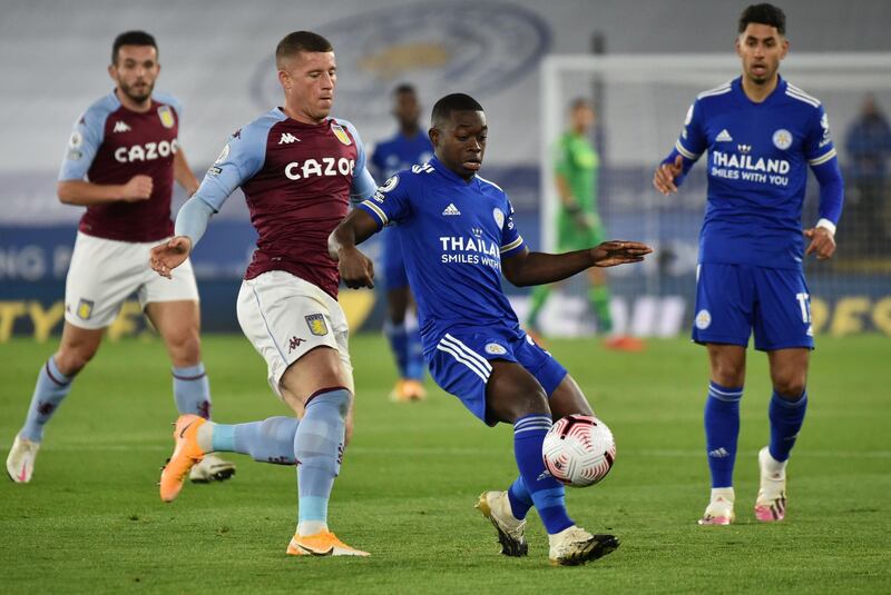 Aston Villa midfielder Ross Barkley closes in on Leicester City midfielder Nampalys Mendy. AFP