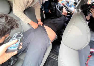 The passenger is arrested at Daegu International Airport, South Korea. AP