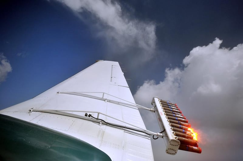 Flares are fired from one of the National Centre of Meteorology's cloud-seeding planes. Courtesy: National Centre of Meteorology
