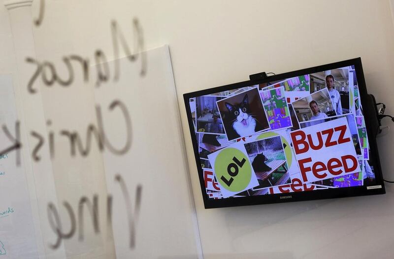 A television monitor displays BuzzFeed content in the company’s office in New York. Shannon Stapleton / Reuters