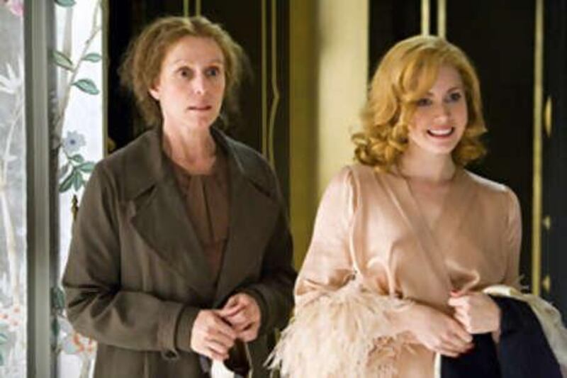 Frances McDormand, left, and Amy Adams are shown in a scene from, Miss Pettigrew Lives For A Day.