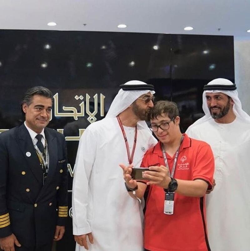 Sheikh Mohamed with UAE Special Olympic swimmer Omar Al Shami. Photo: Omar Al Shami family

