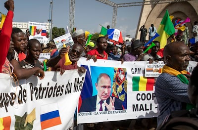 Malians demonstrate against France and in support of Russia in 2020.  AP