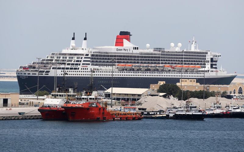 The Queen Elizabeth II luxury cruise liner, also known as the QE2, is seen docked at Port Rashid in Dubai, where it will be moored permanently as a newly refurbished floating hotel on April 18, 2018.  / AFP PHOTO / KARIM SAHIB