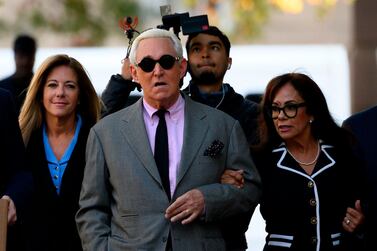 Roger Stone, former adviser to US President Donald Trump, enters the E. Barrett Prettyman United States Court House with his wife Nydia (R) in Washington, DC on November 5, 2019. AFP