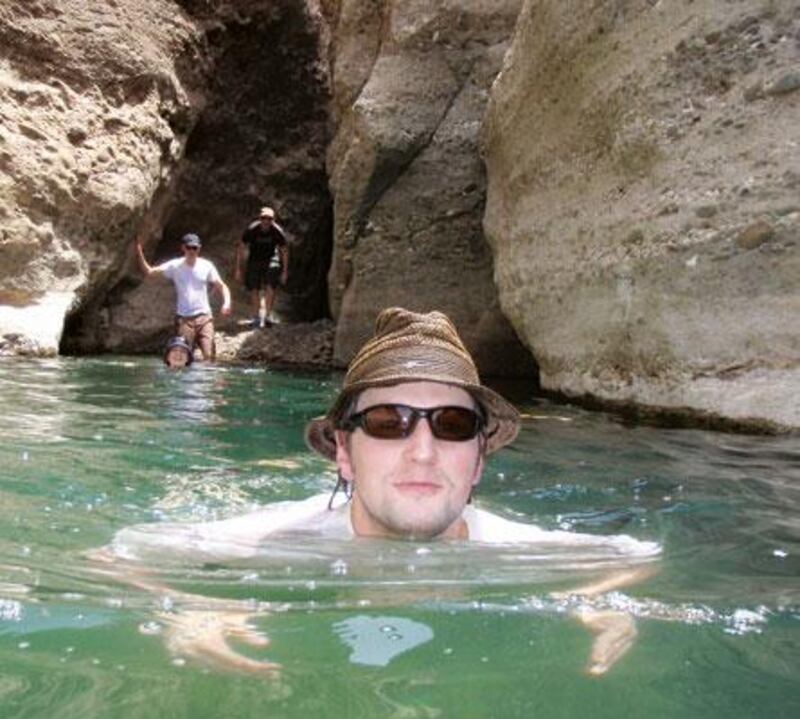 A walk turns into a swim at a visit to Hatta Pools.