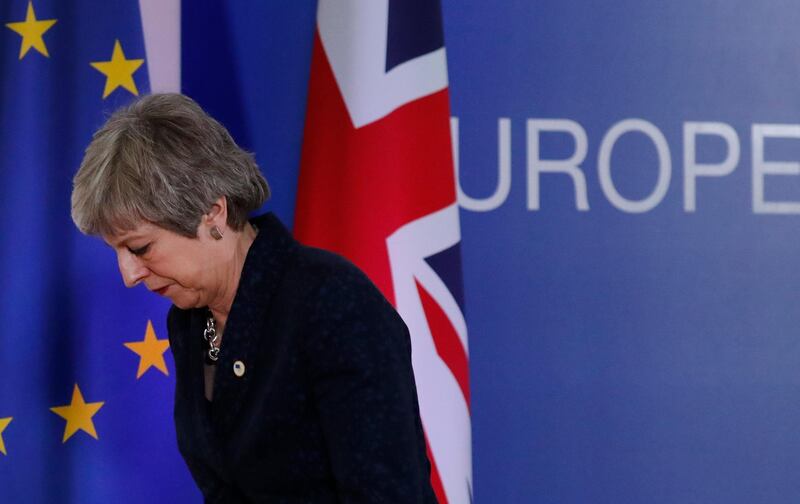 FILE - In this Friday, March 22, 2019 file photo British Prime Minister Theresa May leaves after addressing a media conference at an EU summit in Brussels. Worn down by three years of indecision in London, EU leaders on Thursday were grudgingly leaning toward giving the U.K. more time to ease itself out of the bloc. (AP Photo/Frank Augstein, File)
