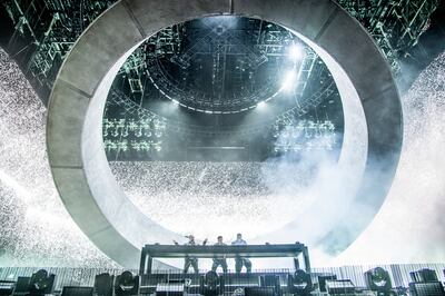 Swedish House Mafia unveiled their new stage set design, featuring a circular structure resembling a flying saucer, at the 2022 Coachella Valley Music And Arts Festival. AP