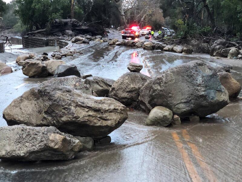 Boulders block a road after a mudslide in Montecito, California. Mike Eliason / Santa Barbara County Fire Department / Handout via Reuters
