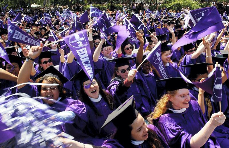 405444 04: Graduating students celebrate during commencement exercises May 16, 2002 at New York University in New York City. The ceremony was NYU's one hundred and seventieth commencement exercise. (Photo by Spencer Platt/Getty Images)