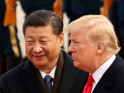 FILE - In this Nov. 9, 2017, file photo, U.S. President Donald Trump and Chinese President Xi Jinping participate in a welcome ceremony at the Great Hall of the People in Beijing, China. Trump is to meet with Xi at the Group of 20 summit in Buenos Aires, Argentina, on Friday, Nov. 30, and Saturday, Dec. 1. (AP Photo/Andrew Harnik, File)