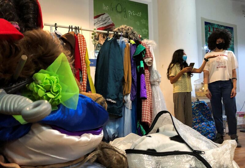 Members of the Cairo-based theatre group Sitara pack props and costumes to be put in storage, after the theatre was closed following the outbreak of the coronavirus disease (COVID-19), in Cairo, Egypt. REUTERS