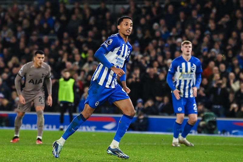 Brighton's Brazilian striker #09 Joao Pedro (C) celebrates after scoring his team fourth goal during the English Premier League football match between Brighton and Hove Albion and Tottenham Hotspur at the American Express Community Stadium in Brighton, southern England on December 28, 2023.  (Photo by Glyn KIRK / AFP) / RESTRICTED TO EDITORIAL USE.  No use with unauthorized audio, video, data, fixture lists, club/league logos or 'live' services.  Online in-match use limited to 120 images.  An additional 40 images may be used in extra time.  No video emulation.  Social media in-match use limited to 120 images.  An additional 40 images may be used in extra time.  No use in betting publications, games or single club/league/player publications.   /  