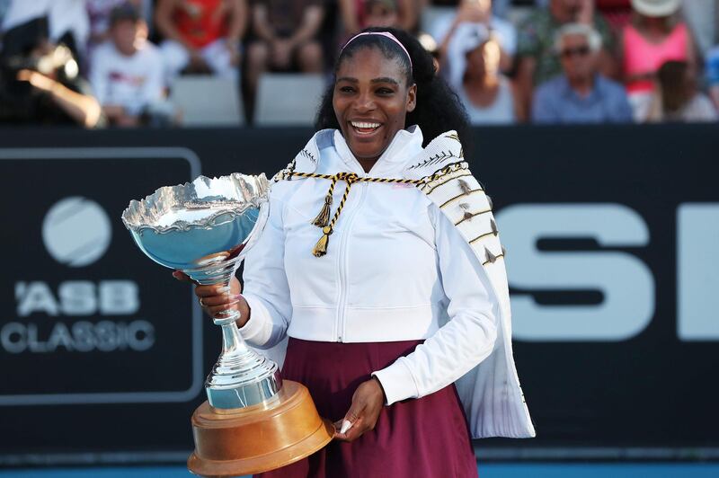 Serena Williams of the US poses with her trophy after winning against Jessica Pegula of the US during their women's singles final match during the Auckland Classic tennis tournament in Auckland on January 12, 2020. / AFP / MICHAEL BRADLEY

