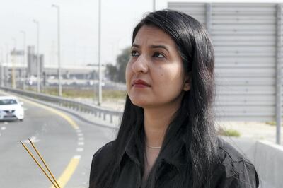 DUBAI, UNITED ARAB EMIRATES , Feb 24 – Sapna Moolchandani today visited the accident site where her sister Roshni Moolchandani killed in the bus accident at the Al Rashidiya exit near entry into Rashidiya Metro car park on June 6, 2019 in Dubai. She prayed there and lit up two sandalwood incense sticks on the pavement near the crash site. This is her first visit to the crash site and she is requesting the authorities to remove this dangerous barrier and place some lighter material to avoid any future accident. This is where 17 people were killed when a bus smashed into an overhead barrier near the Rashidiya exit. Families of the victims have been asking that the barrier to be replaced with lighter material. (Pawan Singh / The National) For News/Online/Instagram. Story by Ramola
