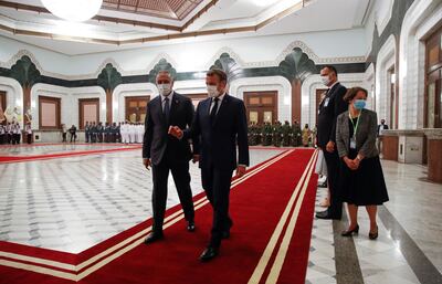 epa08641227 French President Emmanuel Macron (C) arrives for a meeting with Iraqi Prime Minister Mustafa al-Kadhimi in Baghdad, Iraq, 02 September 2020.  EPA/GONZALO FUENTES / POOL  MAXPPP OUT