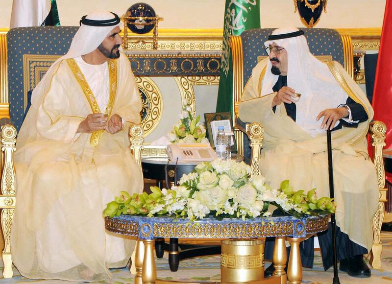 In this handout picture released by the official Saudi Press Agency (SPA), Saudi Arabia's King Abdullah bin Abdul Aziz (R) meets with Sheikh Moammed bin Rashid al-Maktoum, ruler of Dubai and Prime Minister of the Untied Arab Emirates, on the sidelines of the Gulf Cooperation Council (GCC) summit meeting in Riyadh on December 19, 2011. The monarchs of the six Gulf nations are holding their first annual summit since the Arab Spring overthrew a raft of regional governments, including key allies  AFP PHOTO/HO/RESTRICTED TO EDITORIAL USE - MANDATORY CREDIT " AFP PHOTO / SPA " - NO MARKETING NO ADVERTISING CAMPAIGNS - DISTRIBUTED AS A SERVICE TO CLIENTS (Photo by - / SPA / AFP)