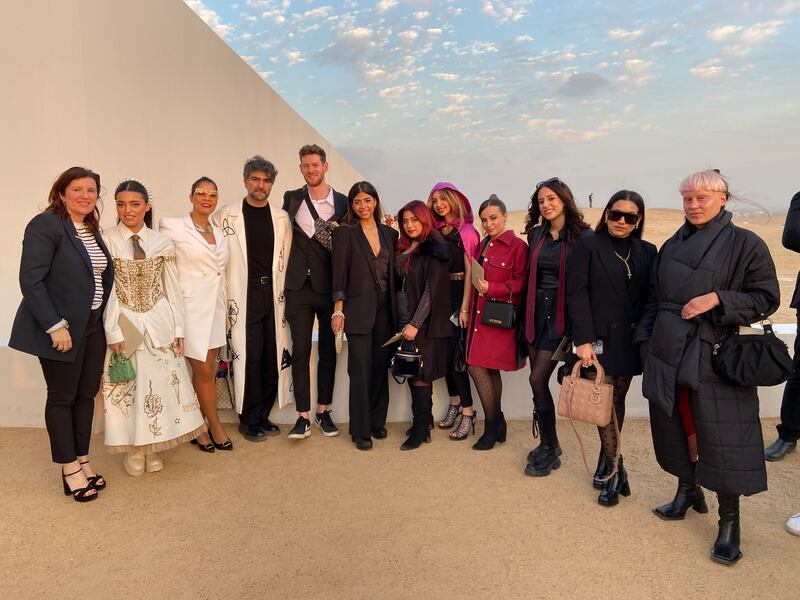 Kegham Djeghalian, a professor of design studies and fashion, with a group of his students . Nada El Sawy / The National