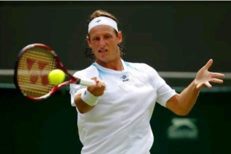 David Nalbandian lost his first-round match against the No 8 seed Janko Tipsarevic.