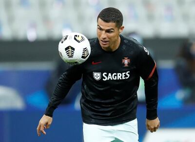 FILE PHOTO: Soccer Football - UEFA Nations League - League A - Group 3 - France v Portugal - Stade De France, Paris, France - October 11, 2020 Portugal's Cristiano Ronaldo during the warm up before the match REUTERS/Gonzalo Fuentes/File Photo