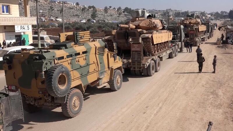 A Turkey Armed Forces convoy is seen at the northern town of Sarmada, in Idlib province, Syria. AP