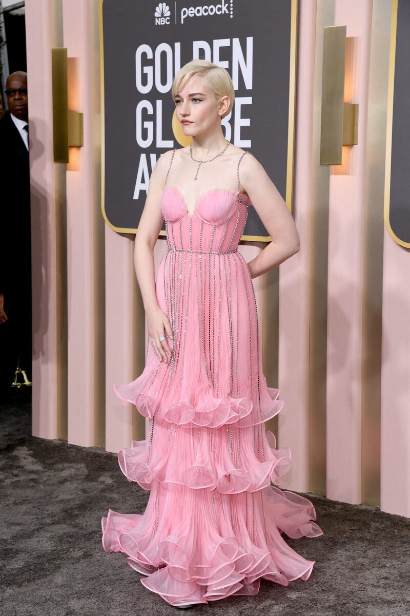 Julia Garner wears Gucci. AFP